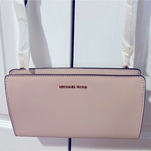 Michael Kors light pink crossbody bag